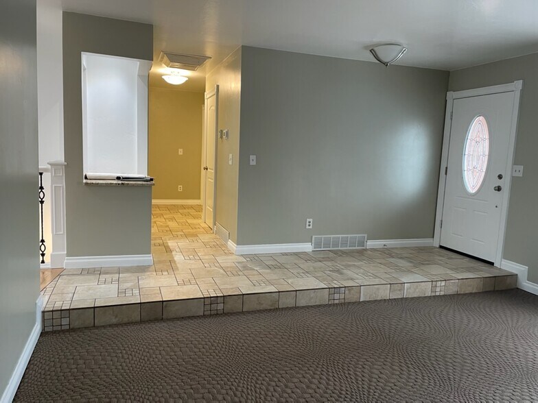 Front room and hall - 9261 S Shad Ln