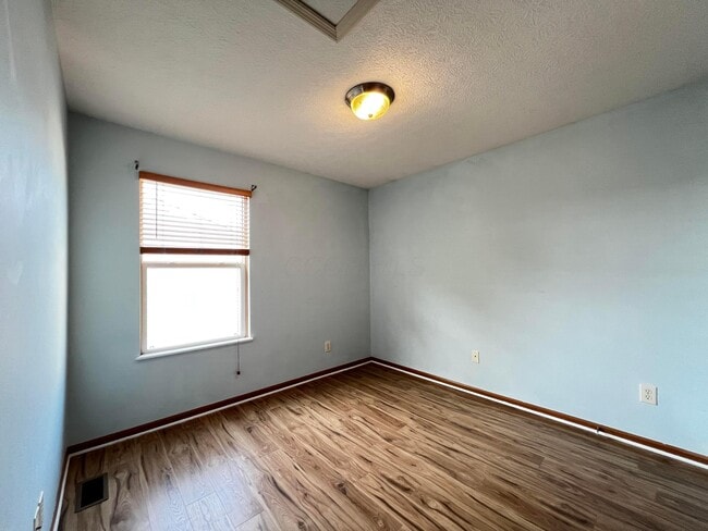 Building Photo - 6171 Womersley Dr