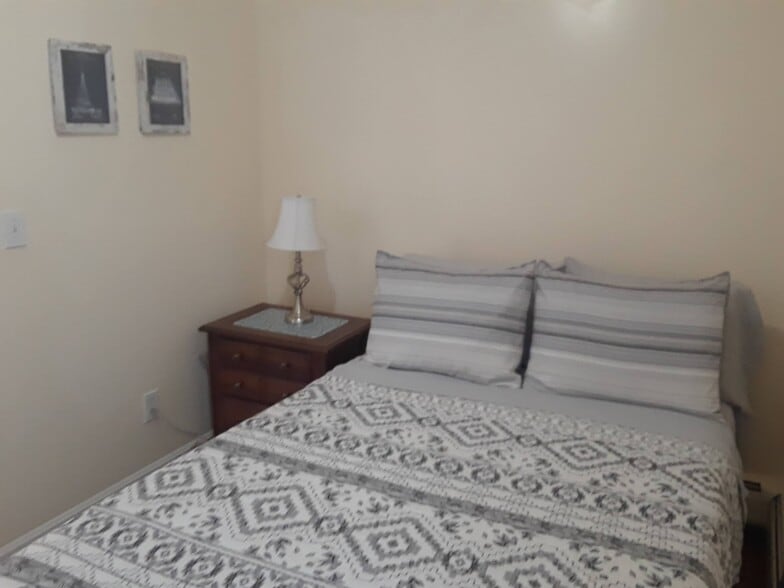 Second bedroom with full size bed. - 56 Fulton St