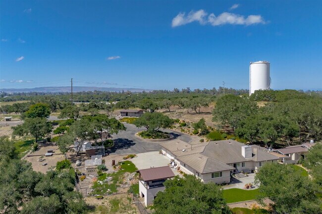 Building Photo - Private Gated Mini-Ranch • 7+ Acres • Luxury Country Living • Indoor Pool • Horses Welcome