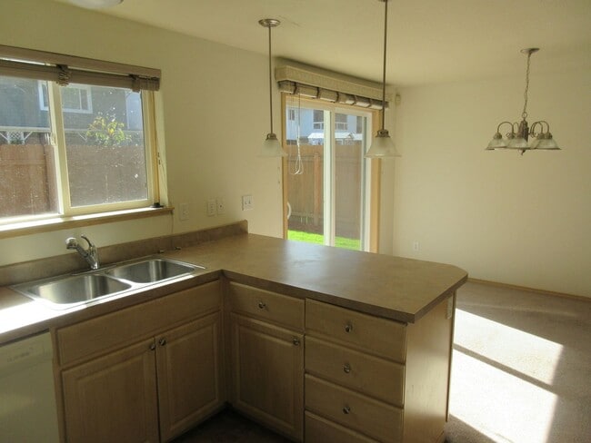 Building Photo - Large Three Bedroom Home, Landscaping Prov...