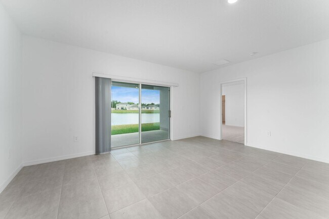 Building Photo - Almost New 4/3.5 Home with Waterview and 2...
