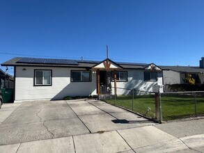 Building Photo - <b>Five Bedroom Three Bath Home with Solar...