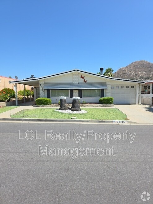 Building Photo - 30715 Arenga Palm Dr