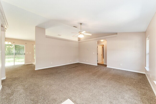 Building Photo - Peaceful 3-Bedroom Home with Open Floor Plan & Two-Car Garage in Rainbow Lakes Estates!