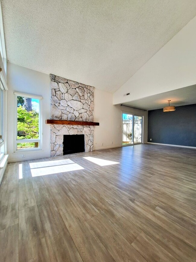 Building Photo - Spacious Two-Story 3bd Townhouse With Private Patios, Balcony, & Garage