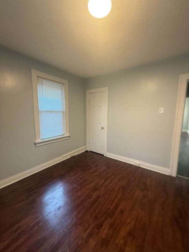 Building Photo - "Charming 2-Bedroom St. Louis Home with Gleaming Hardwood Floors in 63121!"