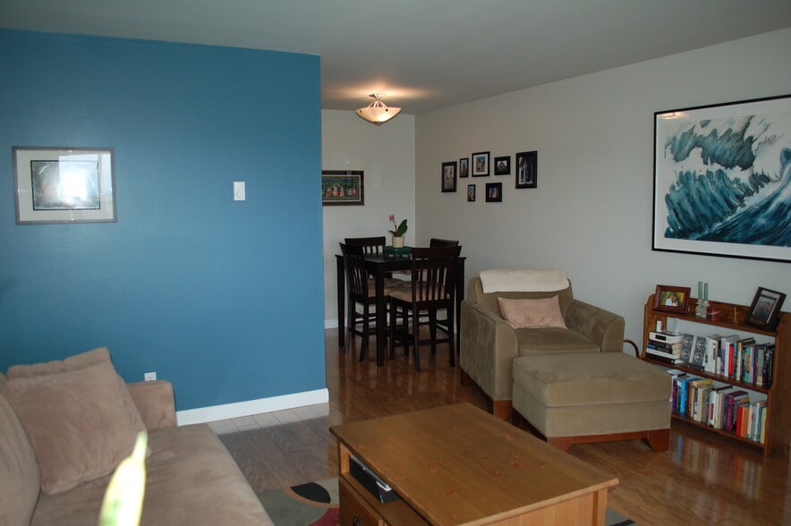 Getting freshly painted pearly white this month. Very spacious, open concept dining and living space - 320 Melrose Ave E