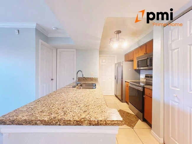 Building Photo - "Charming 2-Bed, 2-Bath Condo Oasis in Kis...