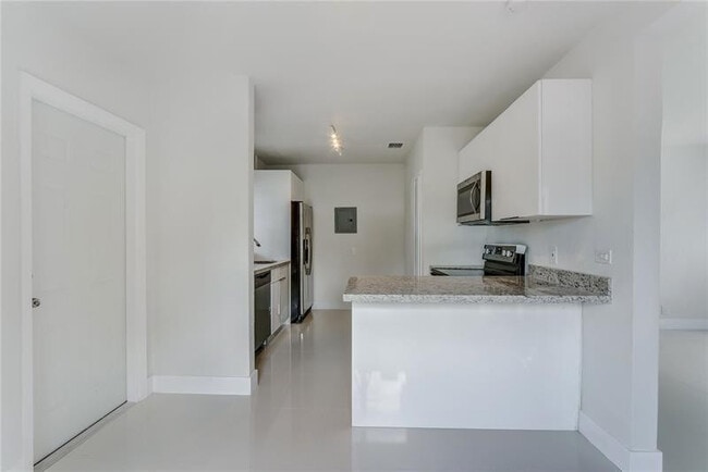 Building Photo - 5715 NW 6th Ave