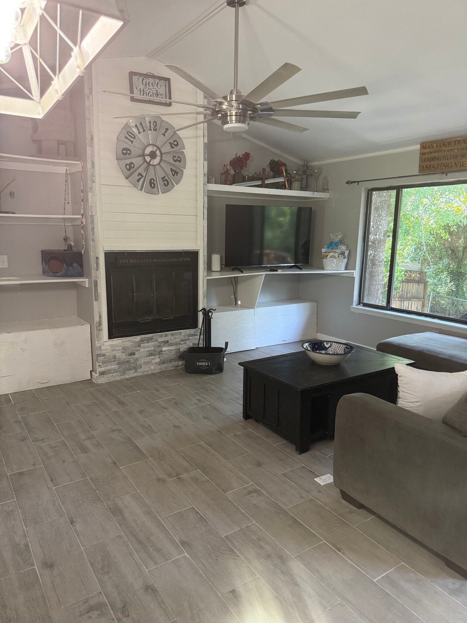 Open concept living room with real fireplace - 109 Cedar Ridge Way