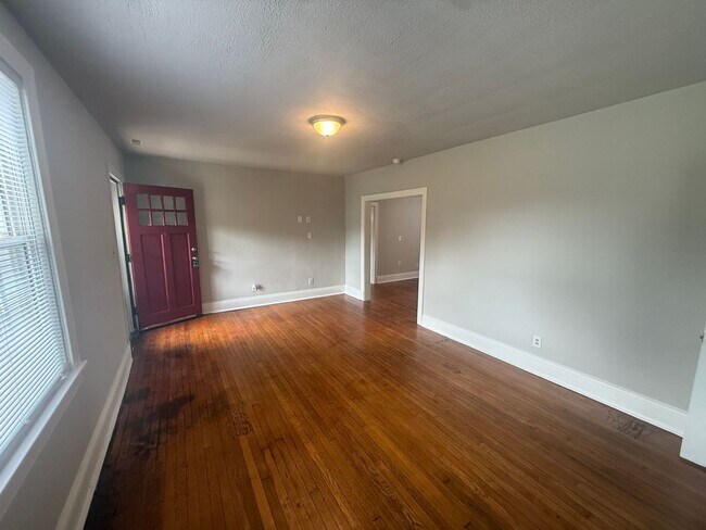 Building Photo - 2-bedroom 1 bathroom Cottage on a large lot with 2 large storage building on site