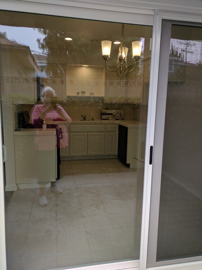 Through patio doors into kitchen - 2206 Graham Ave
