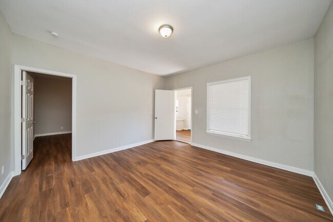 Building Photo - Plenty of Space Inside & Out – 4BR/2BA in ...