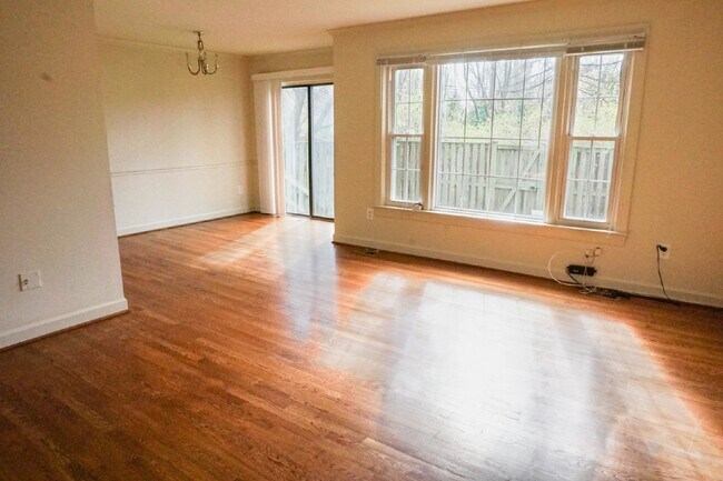 Building Photo - Beautiful brick townhome featuring three f...