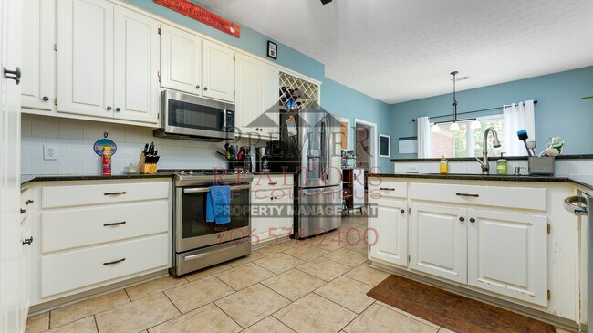 Building Photo - 9230 Garrett Creek Dr