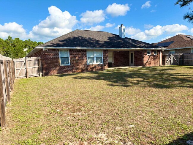 Building Photo - "Charming 4-Bed home in Navarre!"