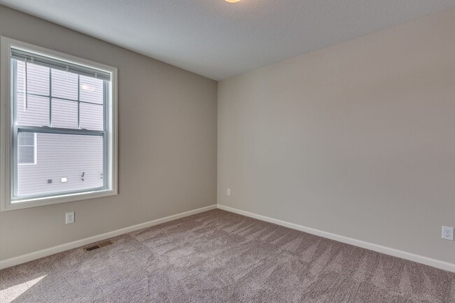 Building Photo - FOR RENT avail April 01: 3bd2ba2car garage END UNIT modern townhome