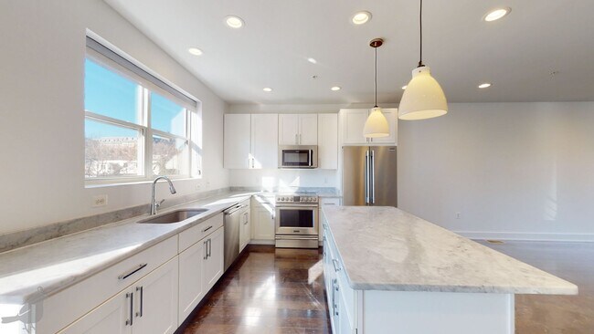 Building Photo - Stunning and Spacious Duplex in Brookland w/ Parking!