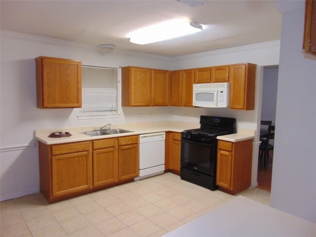 Building Photo - 8603 Rustling Leaves Dr