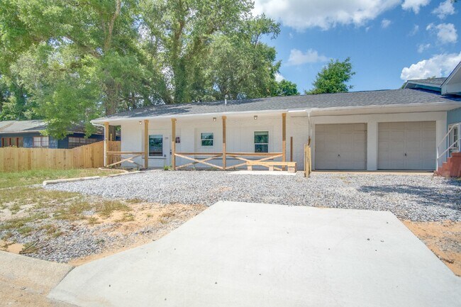 Building Photo - Fully Remodeled 2BR/2BA Attached Home with Garage, Modern Finishes, Park Views & Prime Downtown P...