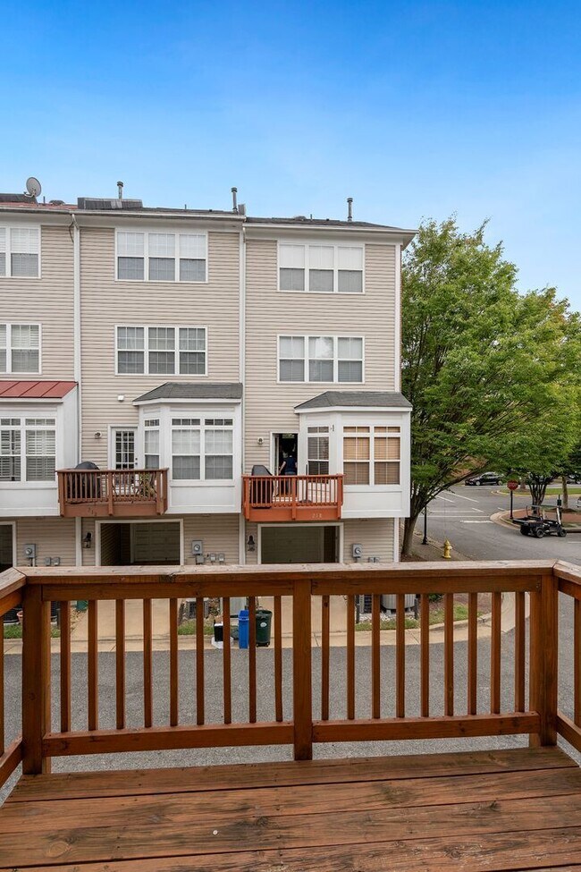 Building Photo - COMING SOON - Great 4 level end unit TH in...