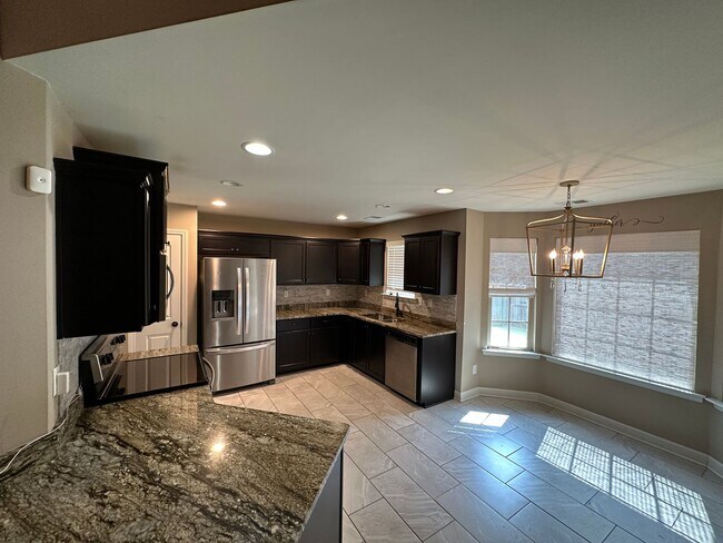 Building Photo - AVAILABLE NOW IN SOUTHAVEN! Spacious 4BR Home with Bonus Room & Fenced Yard