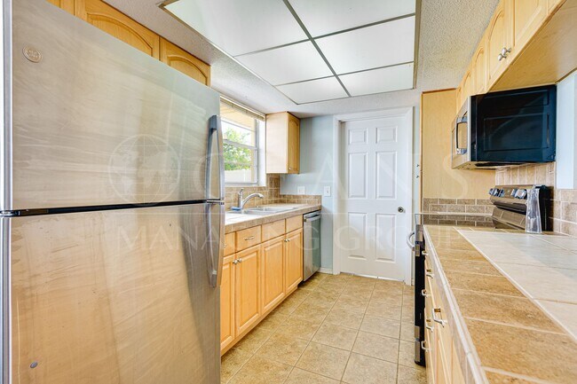 Building Photo - Welcome to your Perfect Beachside Retreat!