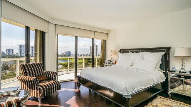 Building Photo - 20191 E Country Club Dr