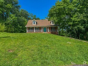 Building Photo - Beautifully Updated--Finished Basement!