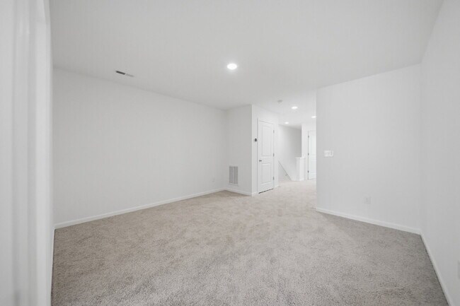 Building Photo - Modern Comfort in a Peaceful Newton Community This newly built 3-bed, 2.5-bath townhome blends mo...