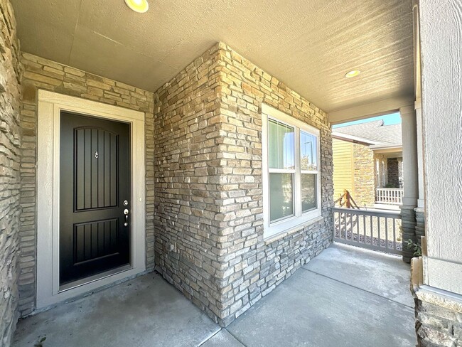 Building Photo - Modern 4-Bed Ranch in Erie with 13-Ft Ceilings, Solar Panels & EV Charger