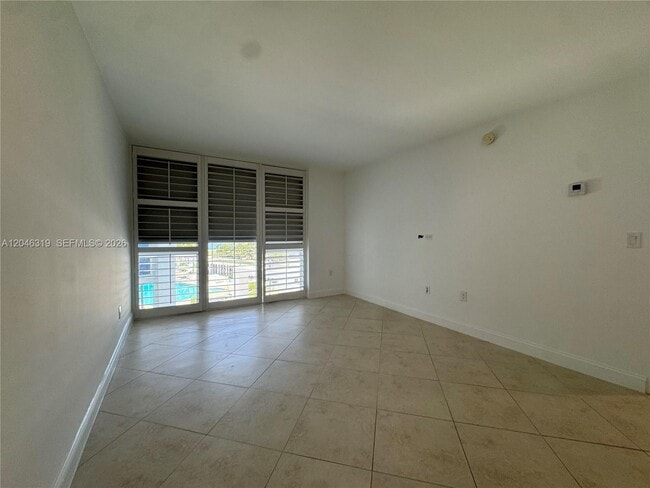 Building Photo - 10275 Collins Ave