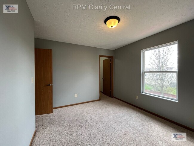 Building Photo - Spacious 4-Bedroom Home with Fenced Backyard, Deck, and 2-Car Garage