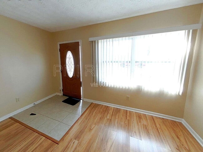 Building Photo - 7819 Lisa Dr E