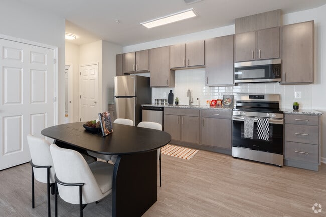 2BR, 2BA - 911SF - Kitchen - Joyfield Flats at Woodbridge