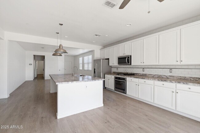 Building Photo - 21451 W Palm Ln