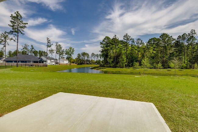 Building Photo - Beautiful 4BR Home in Woodland Trail – Top...