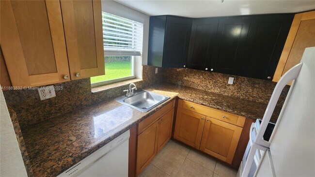 Building Photo - 3090 Coral Springs Dr