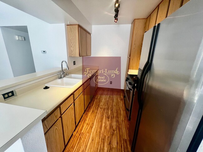 Building Photo - Move in Special!! Upstairs 2 bedroom condo...