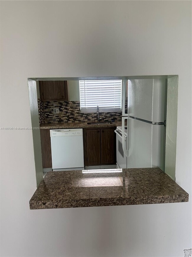 Building Photo - 8110 Sunrise Lakes Blvd