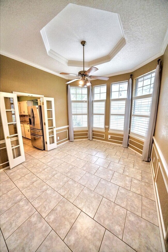 Building Photo - Executive Home in Greenshire with Luxurious Updates and Spacious Outdoor Living - Agent Commissio...