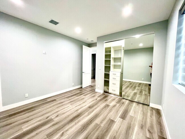 Building Photo - Newly built gated home with top of the lin...
