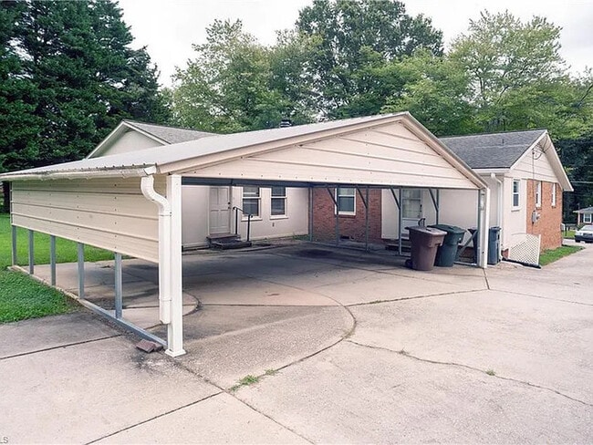 Building Photo - Earn Wealth While Leasing - Like a Homeown...
