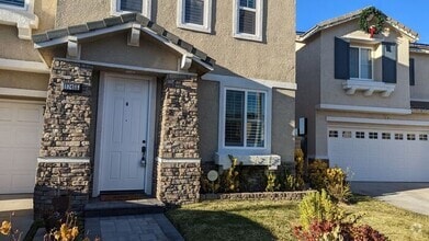 Building Photo - Imagine coming home to a warn Sense of Com...