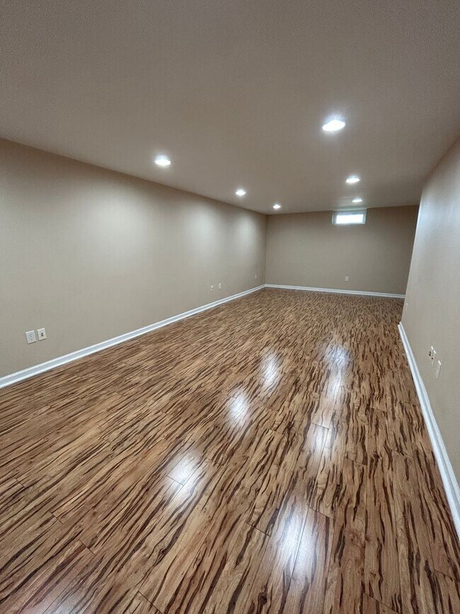 Building Photo - Space, Style - Move-In Ready 4-Bedroom End Unit with Finished Basement & Garage