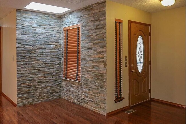 Building Photo - Updated Gem with Shop & Storm Shelter