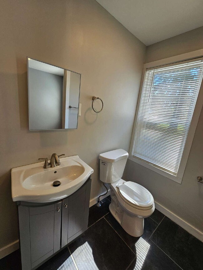 Building Photo - Duplex - 2 Bedroom, 2 Full Bathrooms and a 2 Car Garage. Updated Living Space with Hardwood Floor...