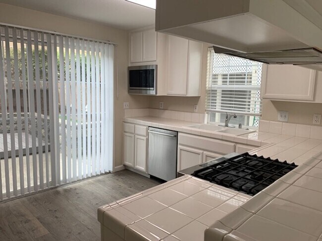 Building Photo - ~4 Bedroom 2.5 Bath House ~ Includes Water & has Solar ~ Huge Savings on Utilities ~
