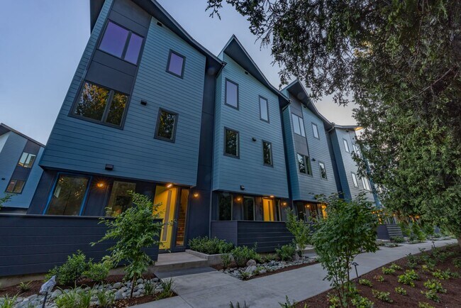 Primary Photo - Riverside Townhomes - Waterfront Living in...